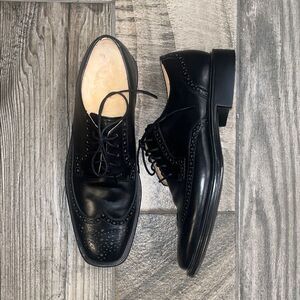 Rockport Black Leather Wingtip Oxfords